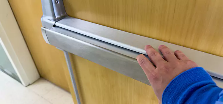 Installing a Push Bar on a Door Ives Estates